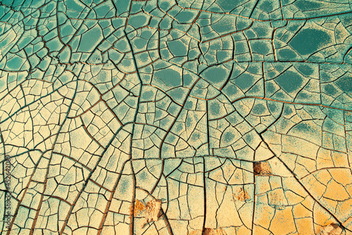 Cracked earth at the site of a dried  lake. Global climate change concept