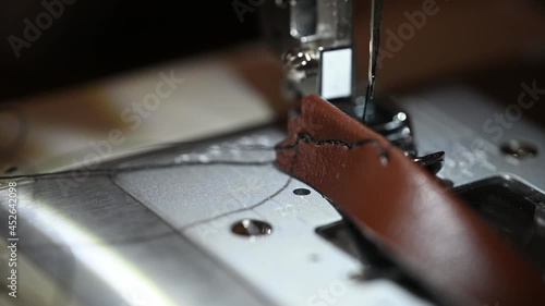 horrible stitching mistake on a sewing machine.  Male hands photo