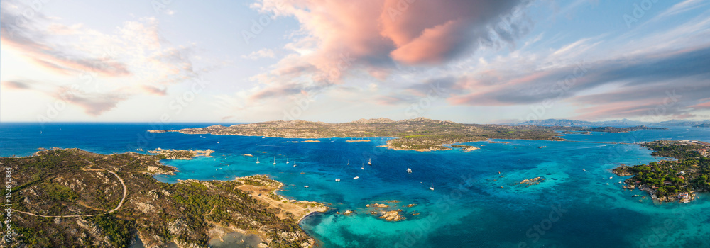 View from above, stunning panoramic view of La Maddalena Archipelago with its turquoise, crystal clear water. Caprera Island in the distance. Sardinia, Italy.