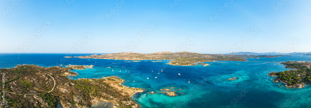 View from above, stunning panoramic view of La Maddalena Archipelago with its turquoise, crystal clear water. Caprera Island in the distance. Sardinia, Italy.