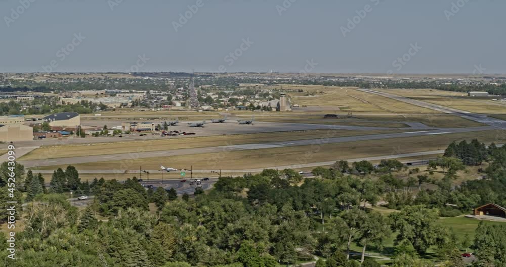 Cheyenne Wyoming Aerial v11 sliding shot along air national guard runway and panning right reveal the landscape in the neighborhood - Shot with Inspire 2, X7 camera - August 2020 Cheyenne Wyoming Aerial v11 sliding shot along air national guard runway and panning right reveal the landscape in the neighborhood - Shot with Inspire 2, X7 camera - August 2020