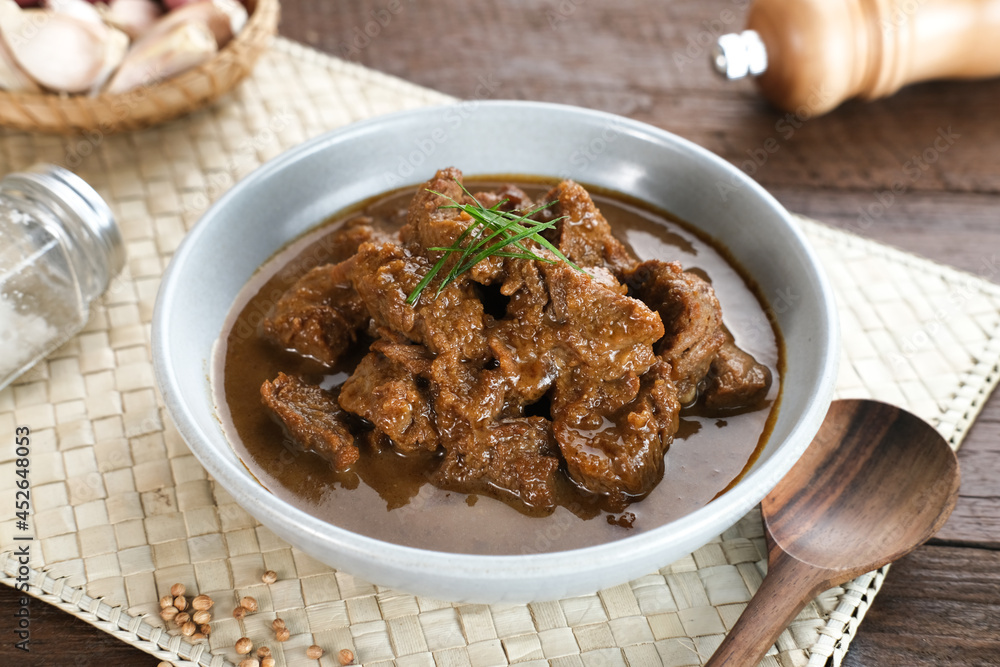 Daging Kelem is a traditional food from Central Java, Indonesia, made from beef, coconut milk and spices. It tastes sweet and savory. Served in bowl, close up.
Daging Kelem is a traditional food from Central Java, Indonesia, made from beef, coconut milk and spices. It tastes sweet and savory. Served in bowl, close up.