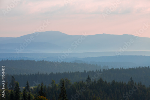 foggy landscape between mountains in the morning