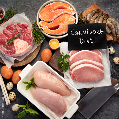 Fotografie Carnivore diet on dark background.