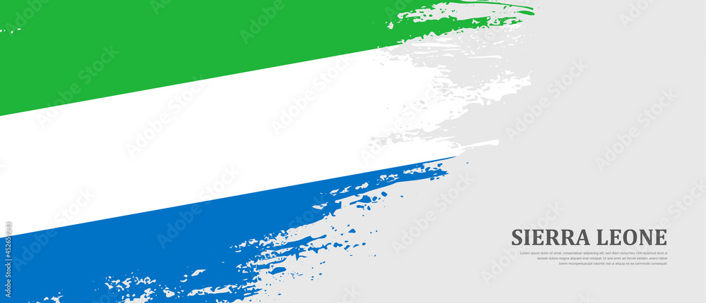 National flag of Sierra Leone with textured brush flag. Artistic hand drawn brush flag banner background