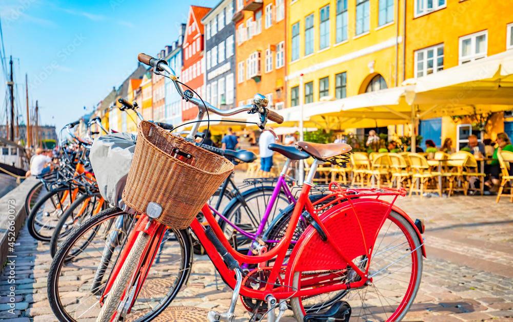 Obraz na płótnie Copenhagen old town, Denmark. Nyhavn harbor, selective focus on bicycle w salonie