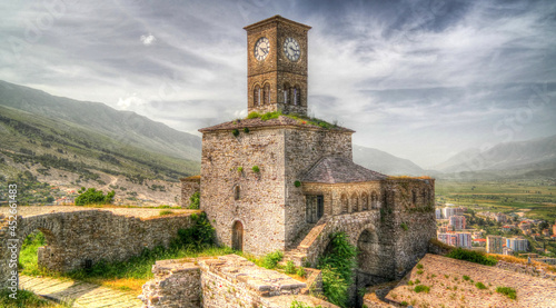 Panoramic view to Gjirokastra castle with the wall, tower and Clock, Gjirokaster, Albania