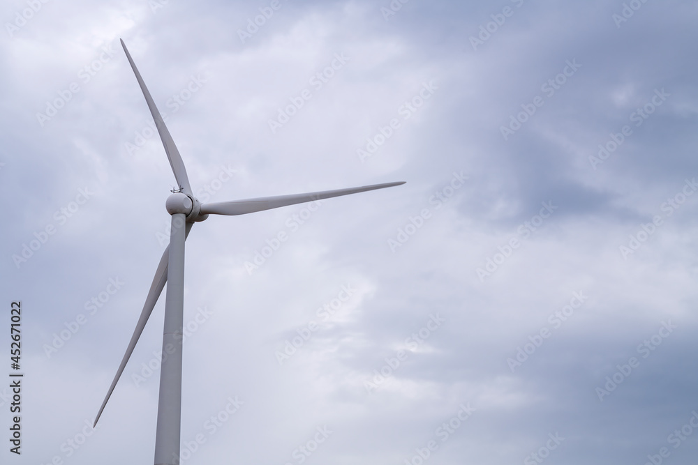 Wind tubing with propeller close up shot with isolated background with sky. Wind turbine isolated with copy space available... Wind tubing with propeller close up shot with isolated background with sky. Wind turbine isolated with copy space available...