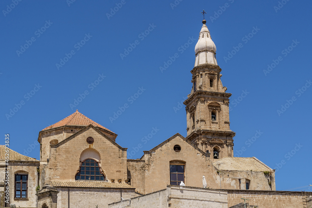 The bell tower of Cathedral Basilica of Maria Santissima della Madia in the historic center of Monopoli, Bari, Puglia, Italy