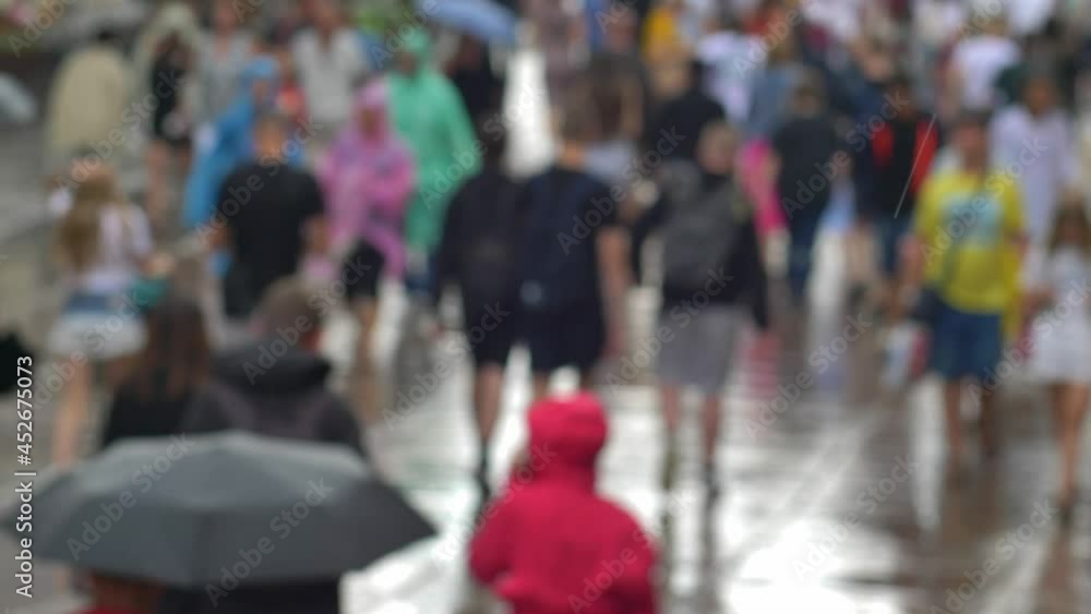 Anonymous Crowd Walking on City Street with Umbrella Slow Motion Bokeh Shot Anonymous Crowd Walking on City Street with Umbrella Slow Motion Bokeh Shot