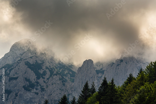 Impressive limestone peaks and beautiful skies in the Dolomite Alps in summer © Calin Tatu