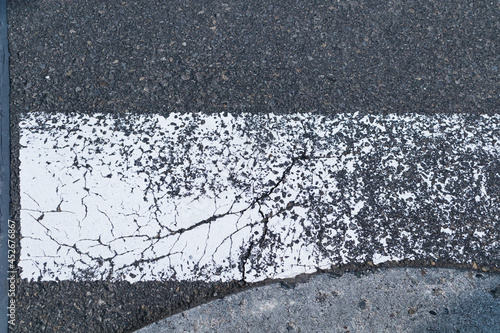Wallpaper Mural Zebra crossway with some faded on asphalt road close-up view Torontodigital.ca
