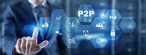 Foto Businessman presses button p2p peer-to-peer on virtual interface