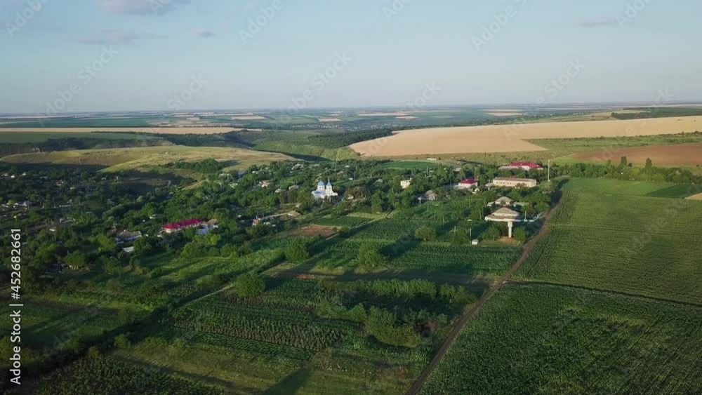 View on the small village with church in center View on the small village with church in center