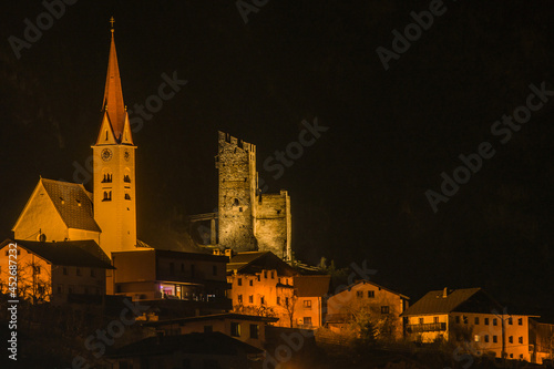 church and castle with village view at night