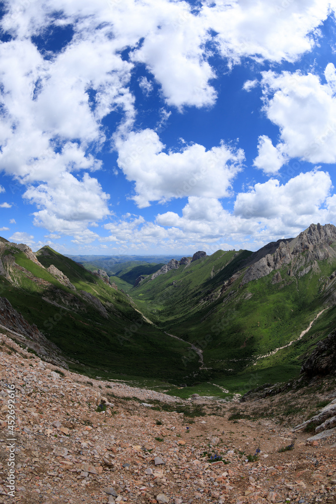 High altitude mountain landscape under blue sky