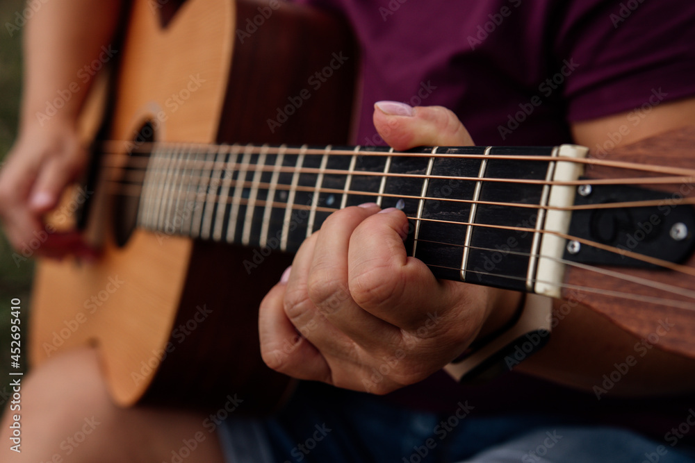 girl playing guitar, learning guitar