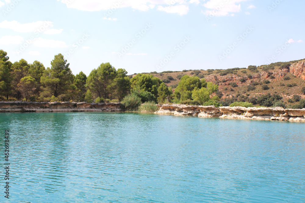 Ruidera, Spain on August 18, 2021: Ruidera lagoons with turquoise blue water 