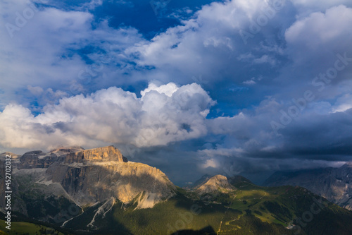 Scenery in the Dolomite Mountains in summer  with dramatic storm clouds