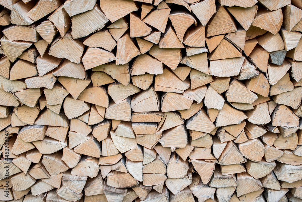 Pile of wood forming a wall. Ecology and deforestation problems in nature. Pile of wood forming a wall. Ecology and deforestation problems in nature.