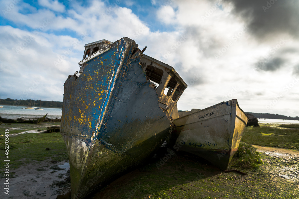 Old abandoned shipwrecks on the river bank Old abandoned shipwrecks on the river bank