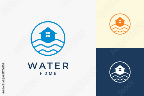 Beach theme residence or apartment logo with ocean wave and circle