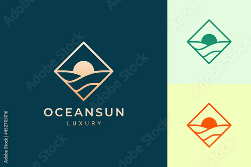 Waterfront or ocean logo in simple rhombus with water wave and sun shape