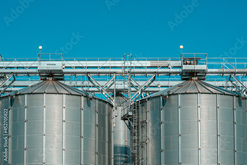Silver silos on manufacturing plant