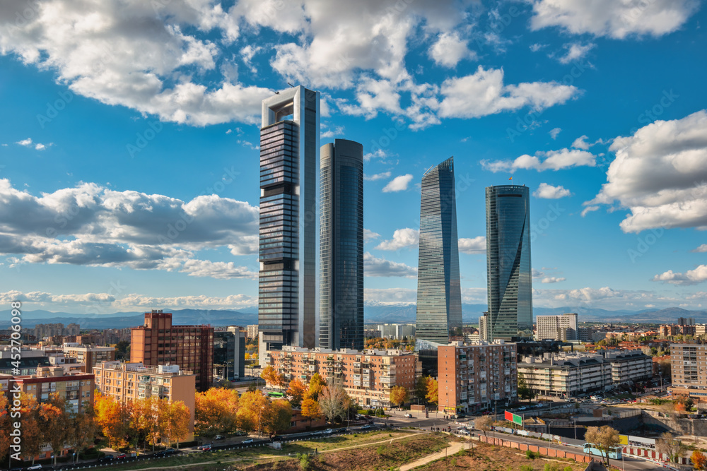 Madrid Spain, city skyline at financial district four towers with autumn foliage season