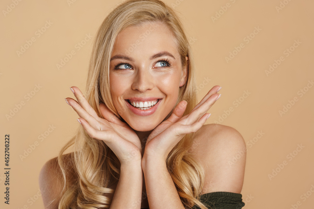 Beauty image of a smiling young blonde woman Beauty image of a smiling young blonde woman