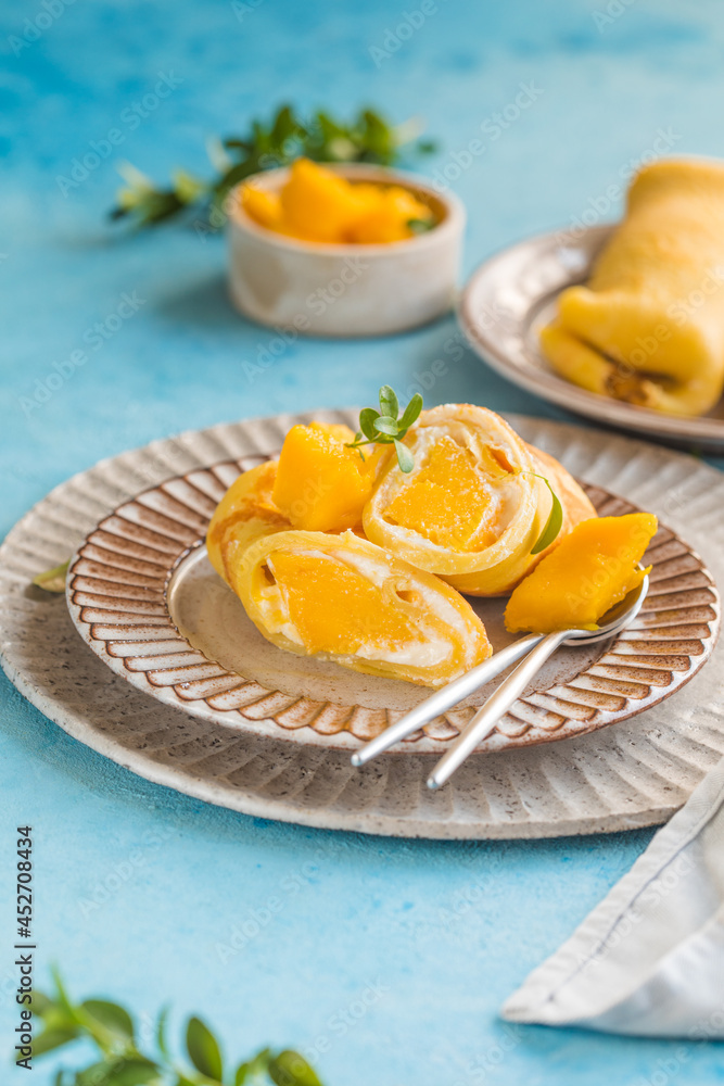 Sticky rice and mango crepe cake roll , .Hong Kong , Thai food style in summer