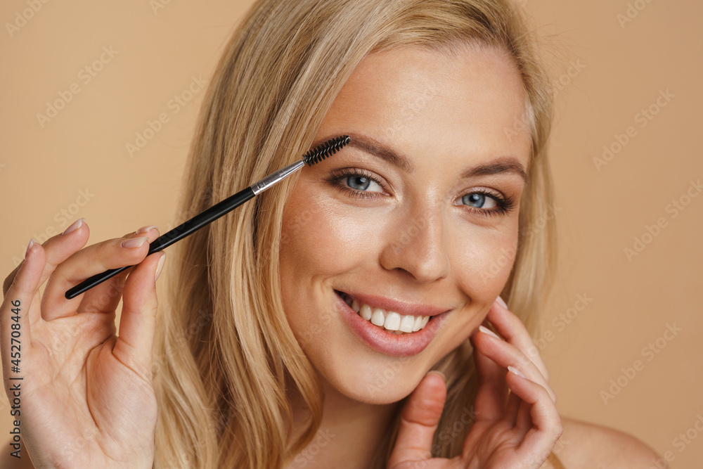 Fototapeta premium Smiling young white blonde woman