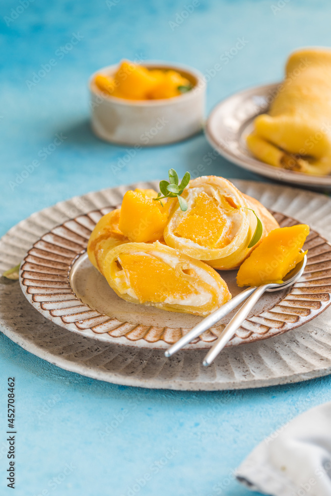 Sticky rice and mango crepe cake roll , .Hong Kong , Thai food style in summer