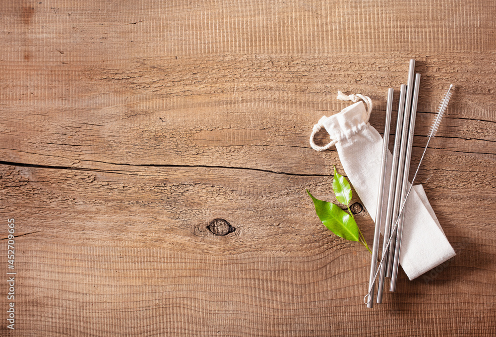 eco-friendly reusable metal drinking straw. zero waste concept eco-friendly reusable metal drinking straw. zero waste concept