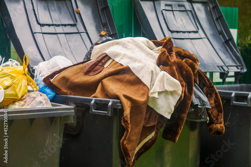фотографія containers with discarded clothing