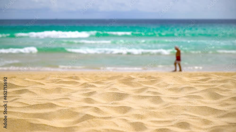 Fine beach sand in summer sun sea motion blur background. Fine beach sand in summer sun sea motion blur background.