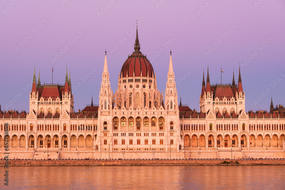Budapest, Hungary. A classic view of the historic parliament building. Danube River and Parliament during sunset. .