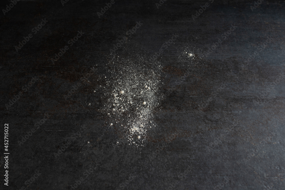 White floured black kitchen top. Background for kitchen works. White floured black kitchen top. Background for kitchen works.