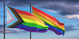 Rainbow colors, new LGBT progress and old flag, Gay pride sign redesign waving on blue sky background, 3d illustration