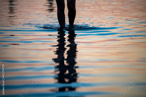 silhouette of person in water