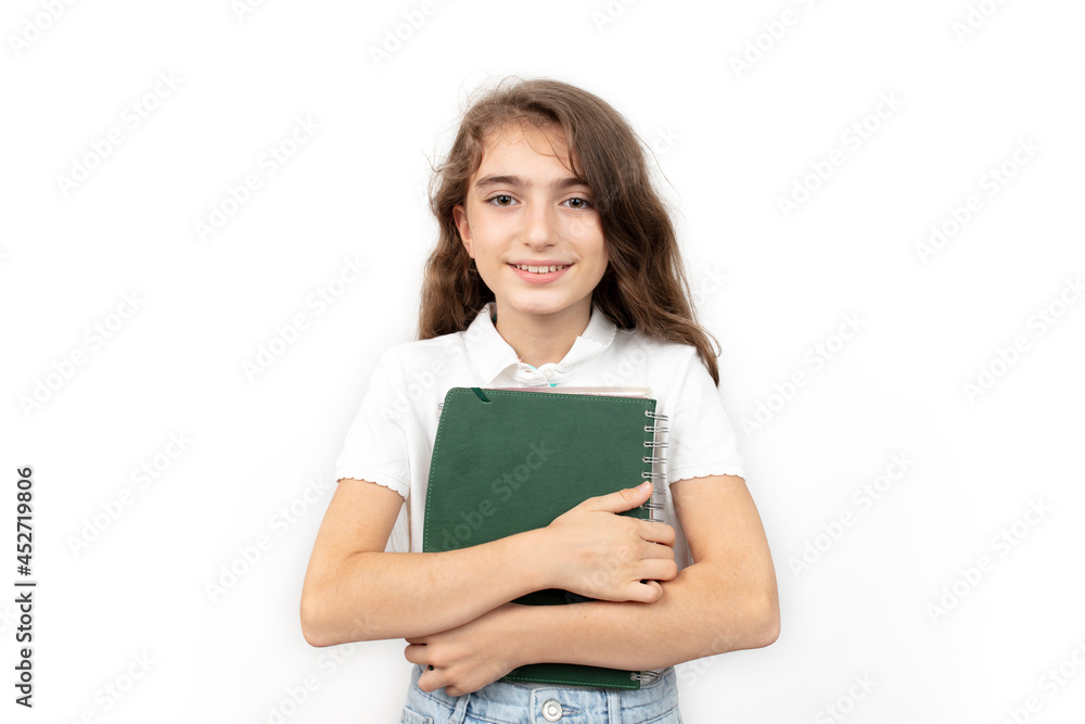 Portrait of smiling school girl child with school bag and books. isolated on a white background. Portrait of smiling school girl child with school bag and books. isolated on a white background.