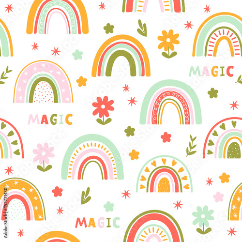 Seamless pattern with bright rainbows and flowers on a white background. Childish illustration.