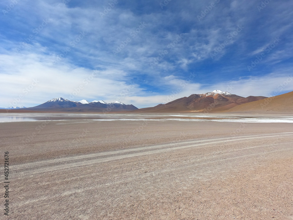 A road near a salt lake in the stone desert of Bolivia near the city of Uyuni. Eduardo Avaroa Andean Fauna National Reserve