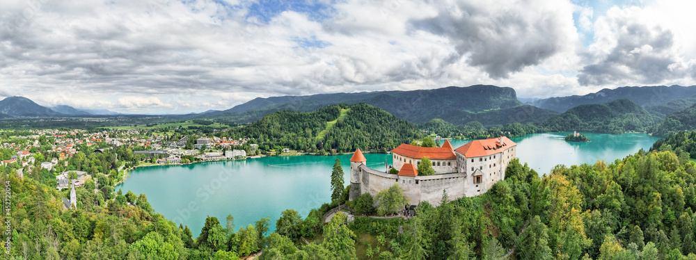 Aerial panoramic landscape of Bled Castle with Lake Bled.