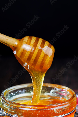 dipped in honey specially made from wood homemade coarse spoon
