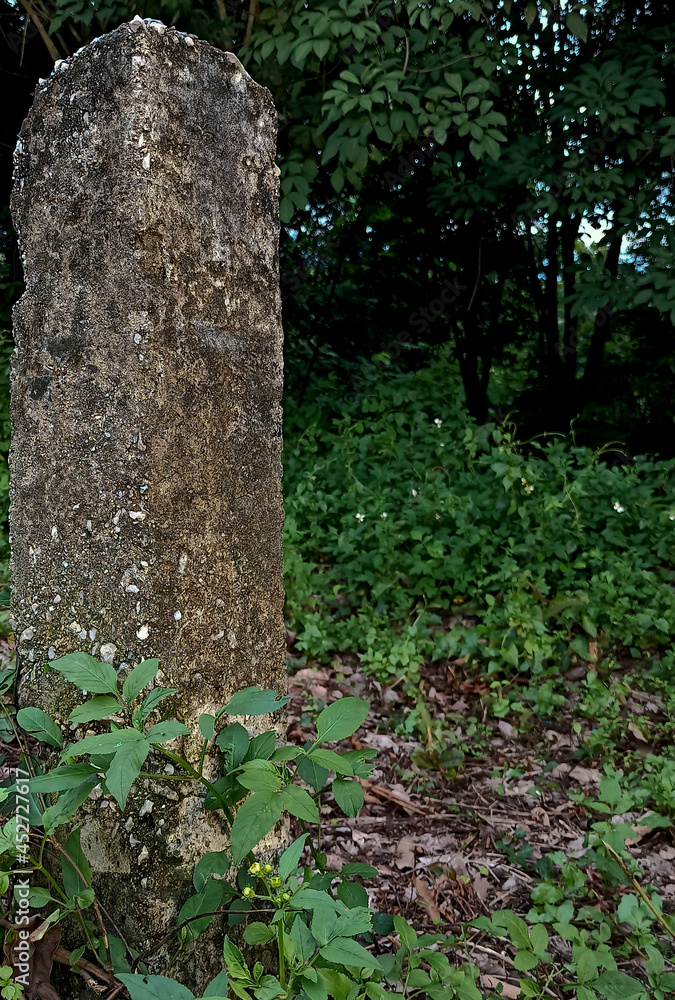 Old concrete pillar beside the road Old concrete pillar beside the road