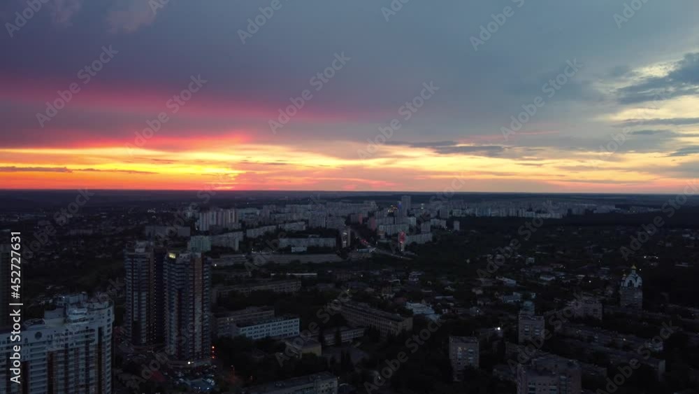 Epic aerial sunset in city residential district Epic aerial sunset in city residential district
