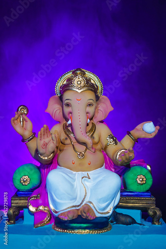 Lord Ganesha, Ganesh Festival, with blue smoke Background