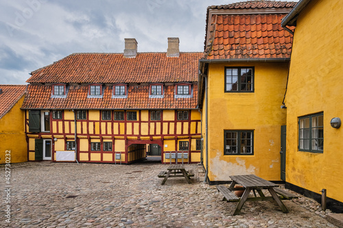 Kerteminde tradional half timbered warehouses near the harbor on Funen, Denmark photo