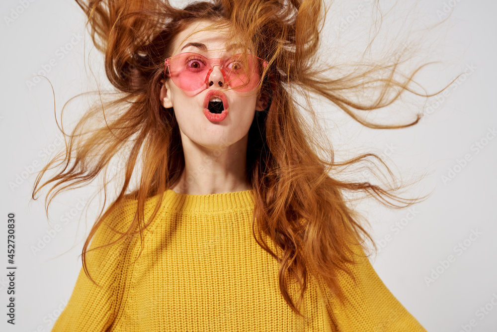 Fototapeta premium beautiful woman in a sweater and glasses hairstyle fashion glasses